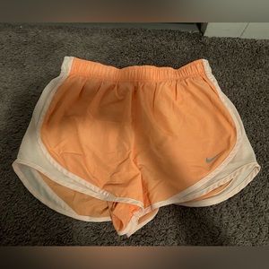 Women’s Nike Athletic Shorts, Light Orange, Size Medium